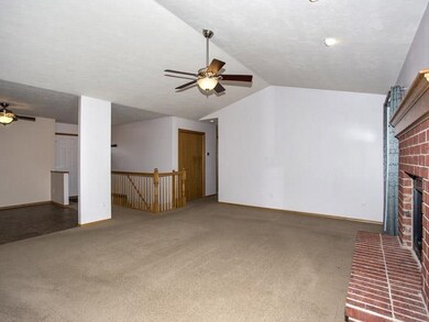 Open to dining, kitchen, and covered deck.