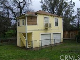 Garage with apartment, sits at back of lot