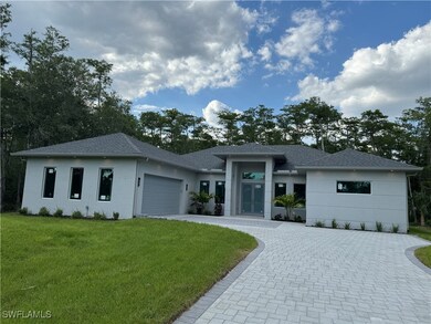 Prairie-style home with stucco siding, decorative