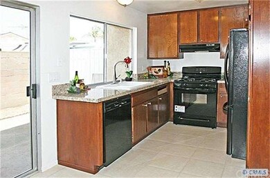 Kitchen Window Overlooks the Large Private Patio