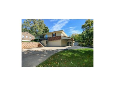 Triple driveway. 2 car garage, screened entrance t
