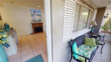 Entry into front from screened patio.