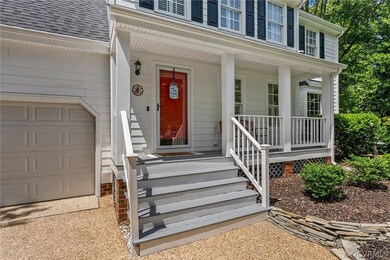 Cozy covered front porch that is perfect to sit on