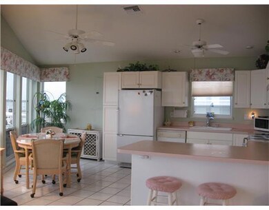 Living Room. 40 FT OF OPEN WATER VIEWS--SEE GORGEO
