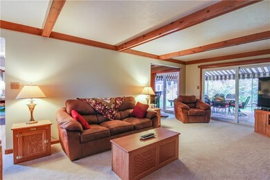 The open floor plan is great for entertaining.  You can also access the expansive deck from a newly updated 10' sliding glass door in this wonderful family room.