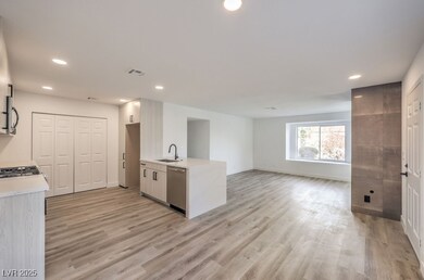 Kitchen with visible vents, dishwasher, light coun
