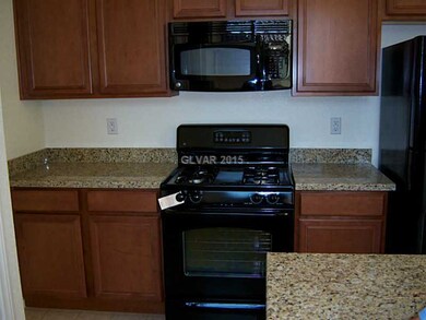 Property Photo. CLOSER VIEW OF KITCHEN CABINETS