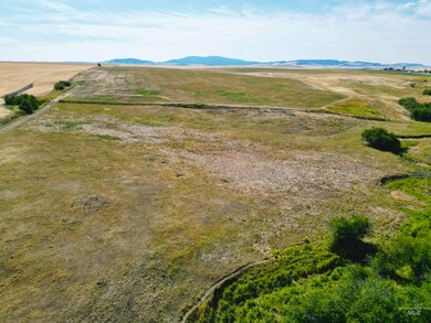 Aerial overview of property's location with mountains