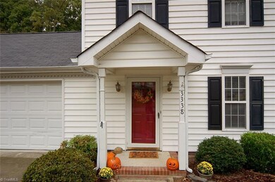 Covered entry and nice landscaping