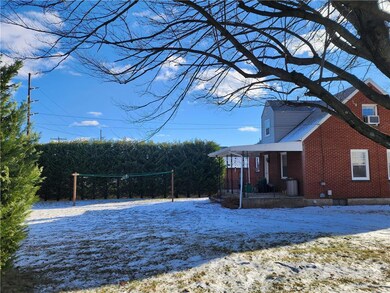 Side view and backyard area