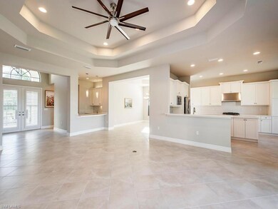 ALTERNATE VIEW INCLUDING WET BAR AND KITCHEN