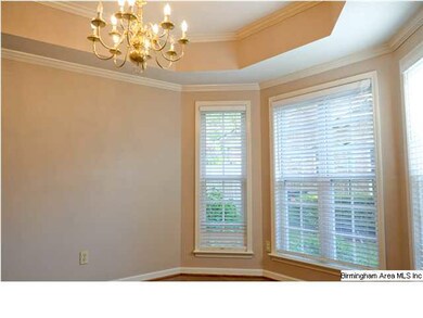 Separate dining area with large windows for natura