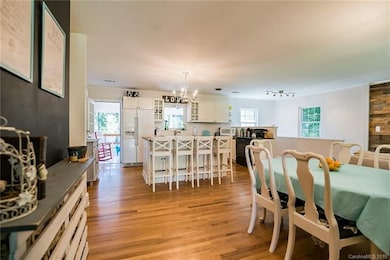 Walk in to the original, gleaming hardwoods and op