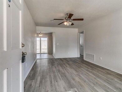 Spare room featuring hardwood / wood-style floorin