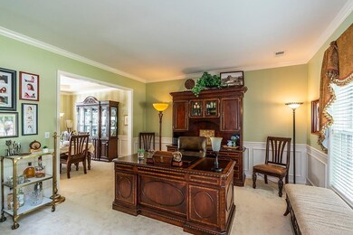 The formal dining room is framed by a ve