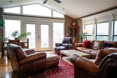 Family room that I'm swooning over!  This was part of the remodeled addition that is seamless and looks like it was MEANT to be here.  The windows have a filter to help softening the suns glare but still lets load of light in.