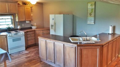 Large Gourmet Kitchen, Maple Cupboards and plenty 