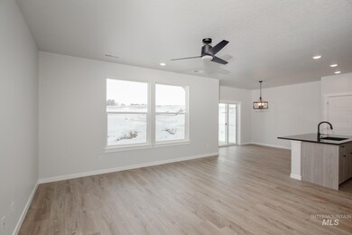Unfurnished living room featuring recessed lighting, light wood finished floors, and a ceiling fan