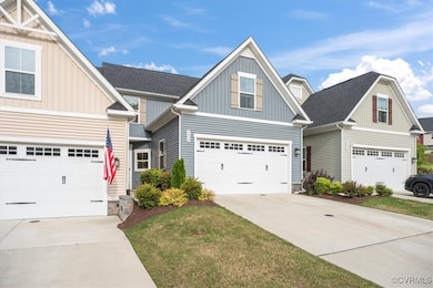 Craftsman inspired home with driveway, board and b