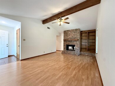 Unfurnished living room with a ceiling fan, wood 