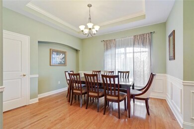 Bright, open dining room with direct kitchen acces