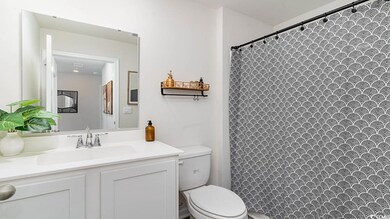 Bathroom with vanity and toilet