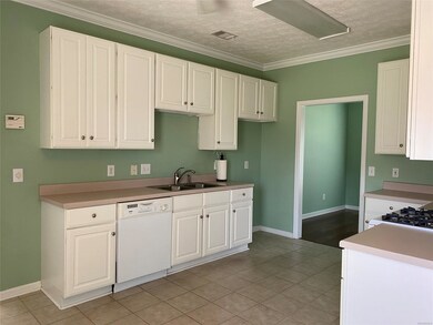 Lots of cabinets in this kitchen.
