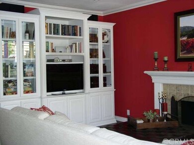FAMILY ROOM BUILT IN ENTERTAINMENT CENTER AND FIRE