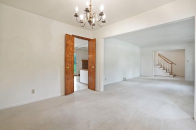 Double-door opening to the Kitchen