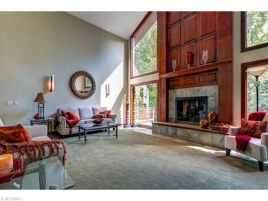 The foyer opens to a vaulted 2-story Great Room wh