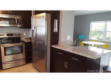 open kitchen to living/dining area. Granite counte