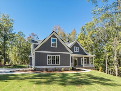 Craftsman inspired home featuring a porch and a fr