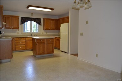 The eating space in the kitchen is out of the way 