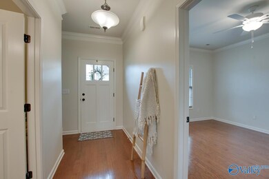 The gorgeous foyer measures 12x5 and features 9ft 