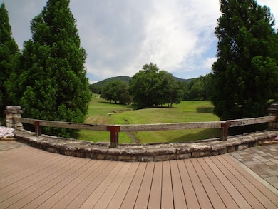 Bridge over creek that feeds the ponds