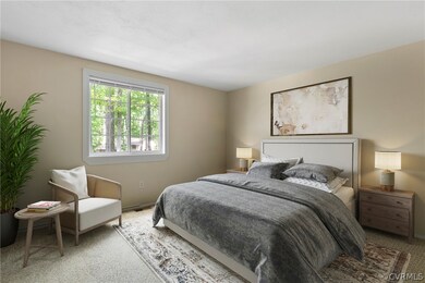 Virtually Staged. Bedroom with carpet floors