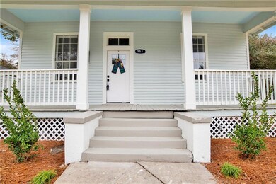 Property entrance featuring a porch