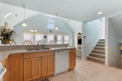 Kitchen open to living room & dining room