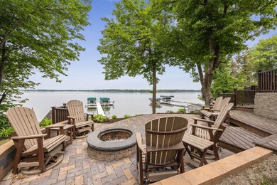 This property offers terraced landscaping with multiple great spaces overlooking the lake for entertaining or relaxing. Paver patio with fire pit was installed fall of 2022.