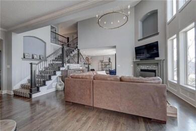 Stunning Chandelier over the hearth room with eleg