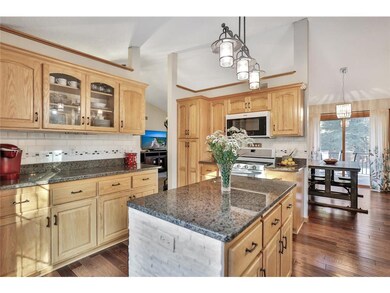Updated kitchen includes hardwood floors, granite 