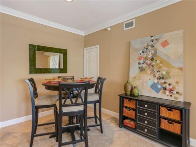 The cheerful dining area has a huge coat and stora