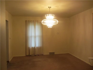 Dining Room. Spacious dining room with glass chand