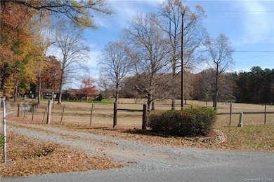 Driveway off Abernathy Rd up to main home