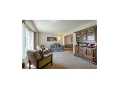 Additional view of living room with entrance into 