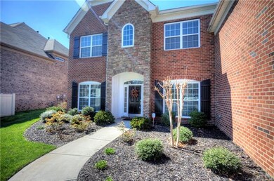 All brick with stone accent