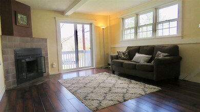 Living room, fireplace and walk-out balcony with p