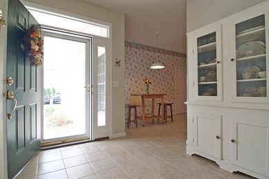 Enter through the charming covered front porch int