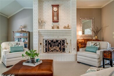 Another view of living room fireplace