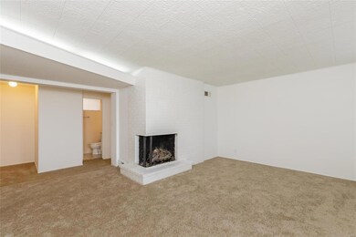The family room also has a gas fireplace.  Notice 